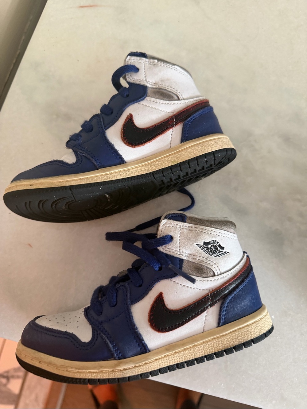 Nike Kids White and Blue High-Top Sneakers with Black Swoosh